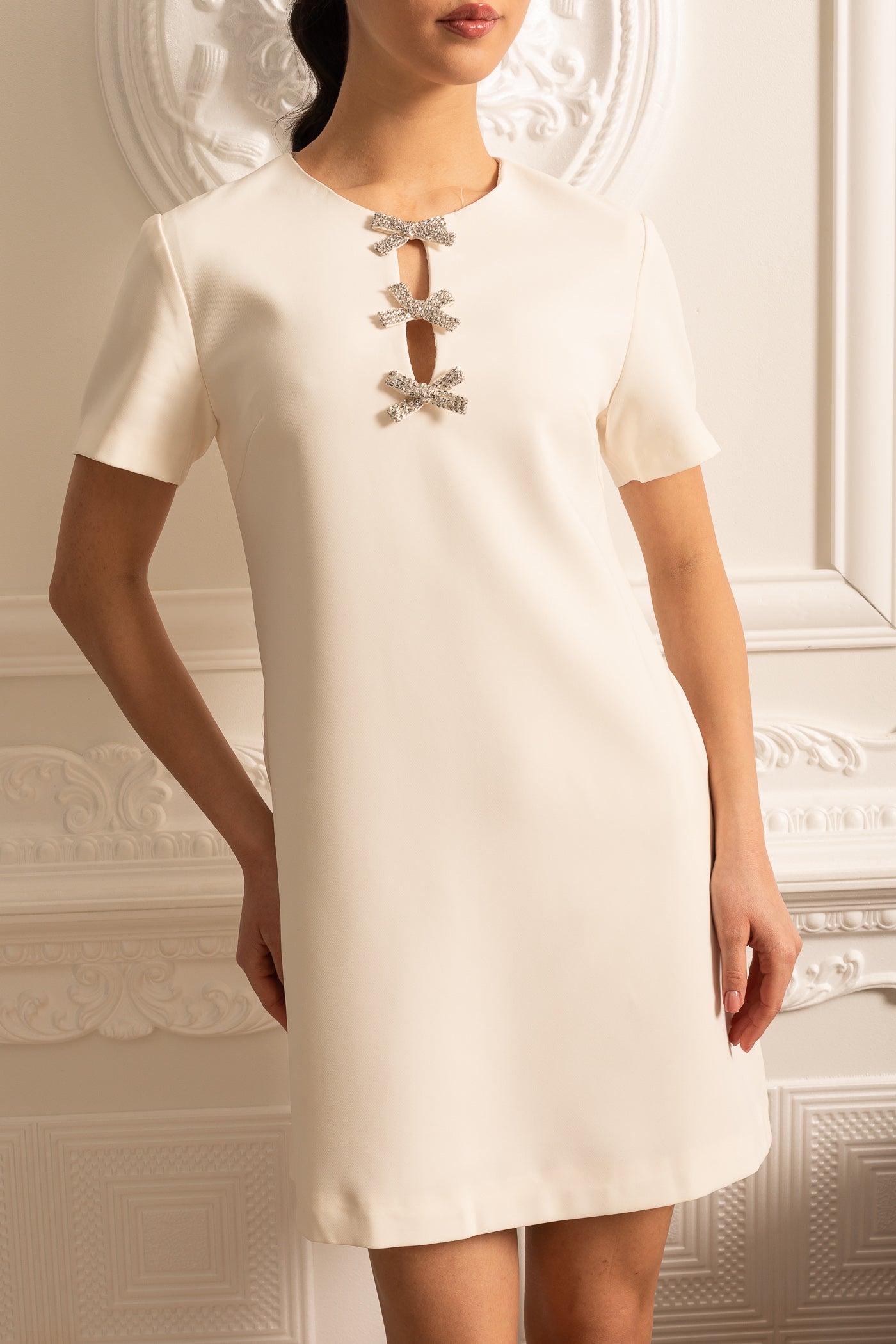 White Short Sleeved Mini Dress With Sparkling Neckline Bows