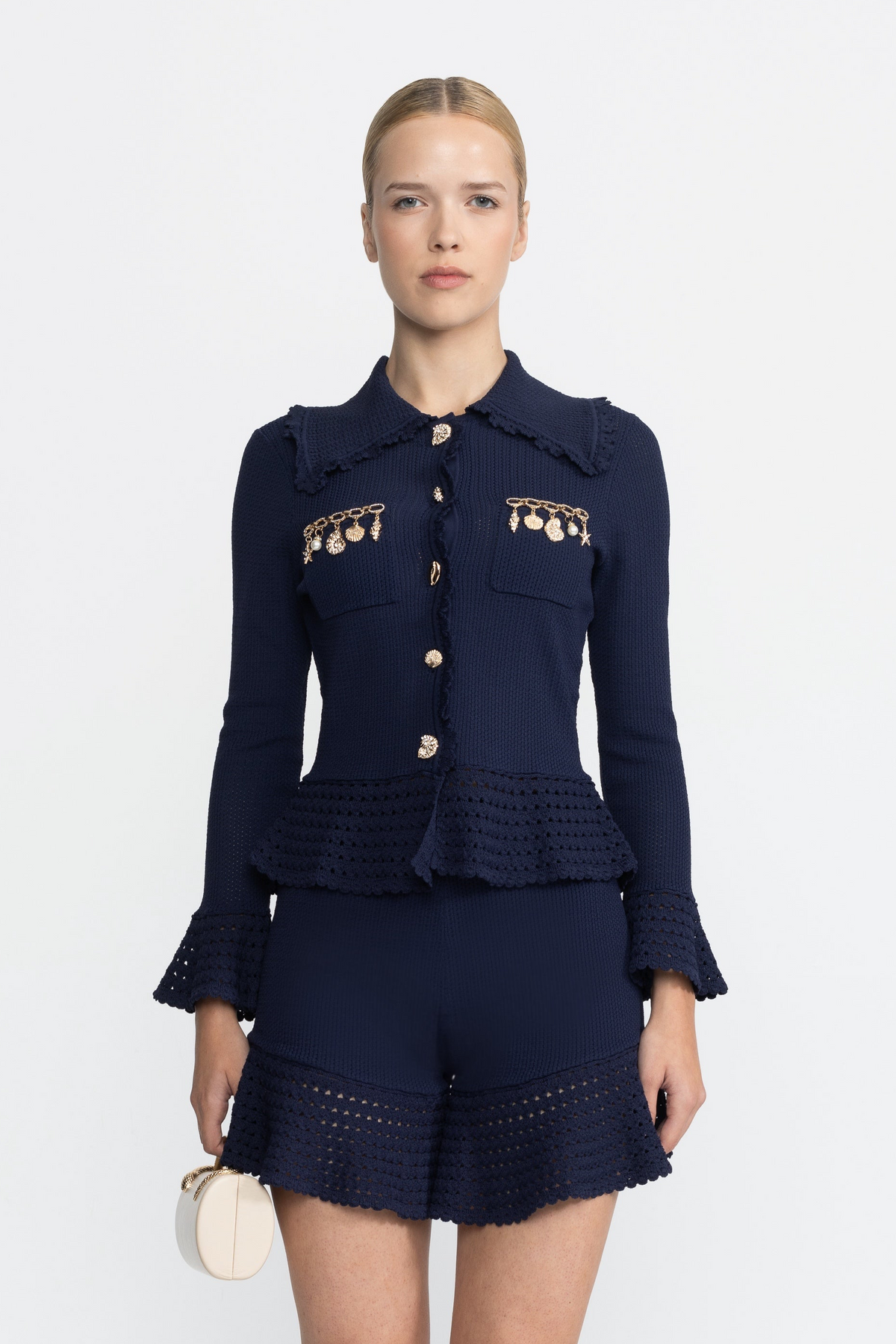Set coordonat din cardigan tricotat cu charmuri și peplum și pantaloni scurți cu volane - Bleumarin