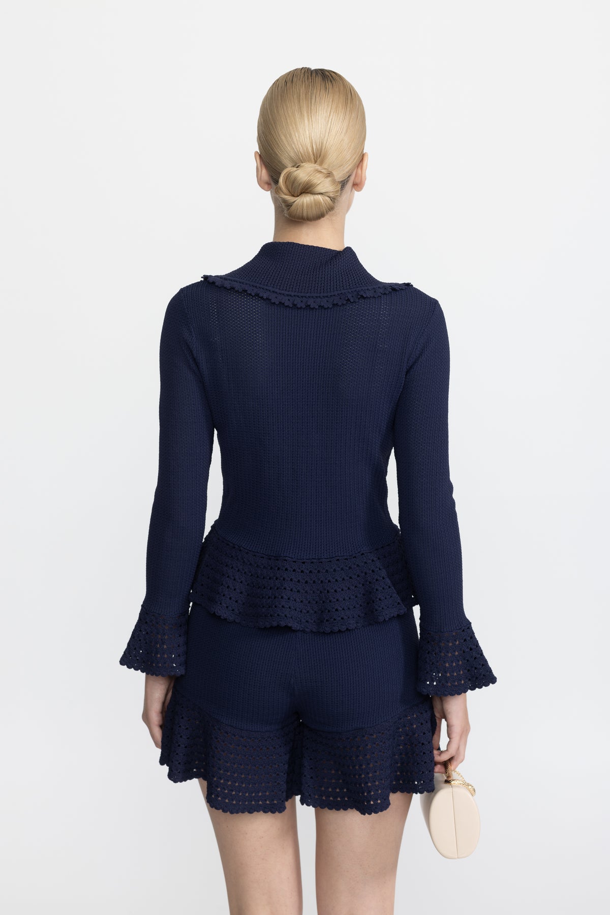 Set coordonat din cardigan tricotat cu charmuri și peplum și pantaloni scurți cu volane - Bleumarin