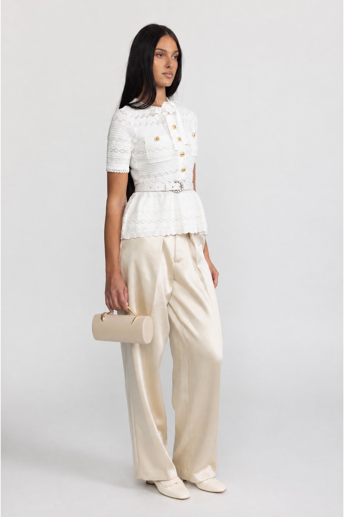 Top peplum alb din tricot pointelle cu fundă