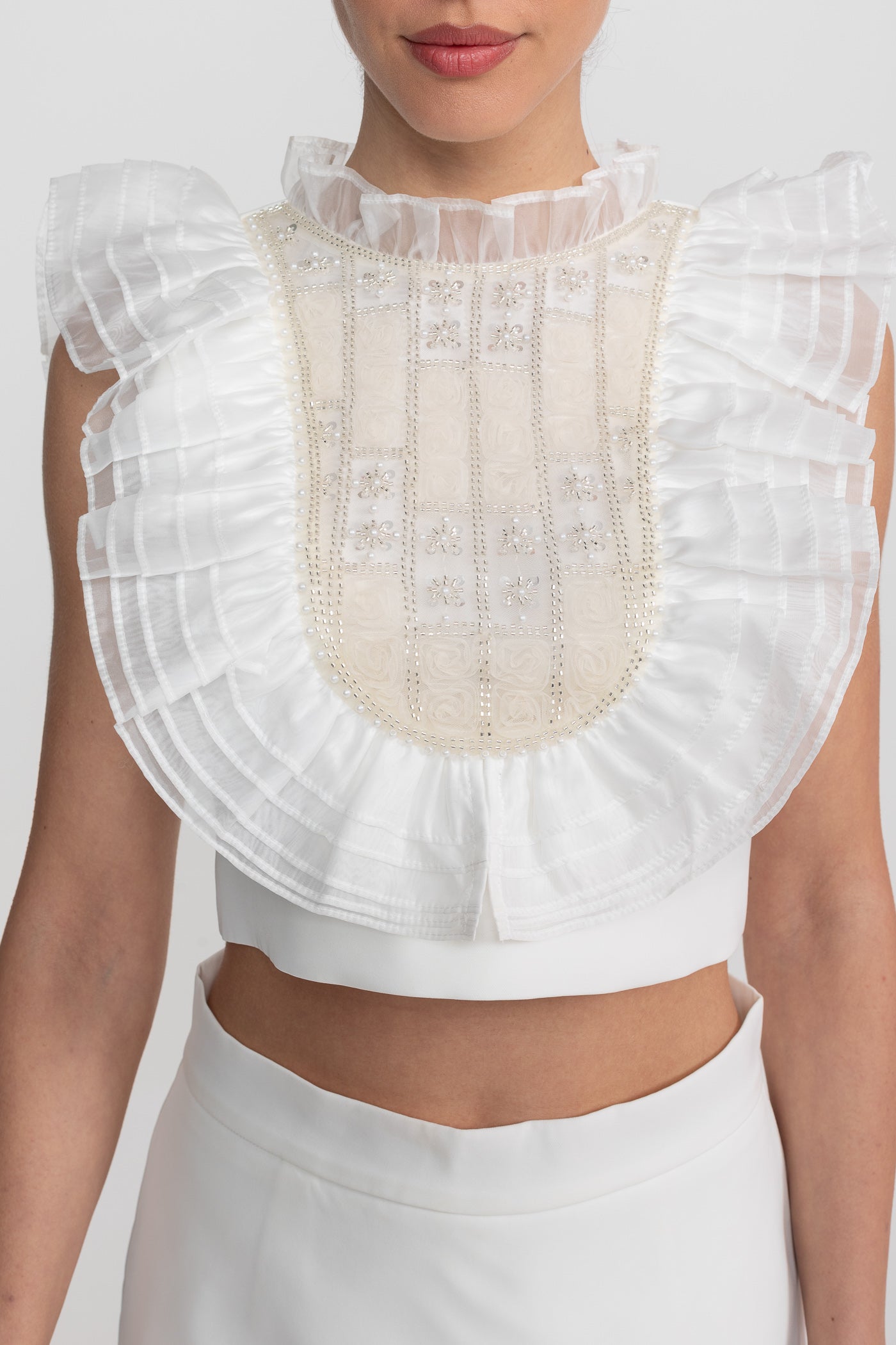 Sleeveless Co-Ord Set With Pleated Ruffle Bib Detail - White