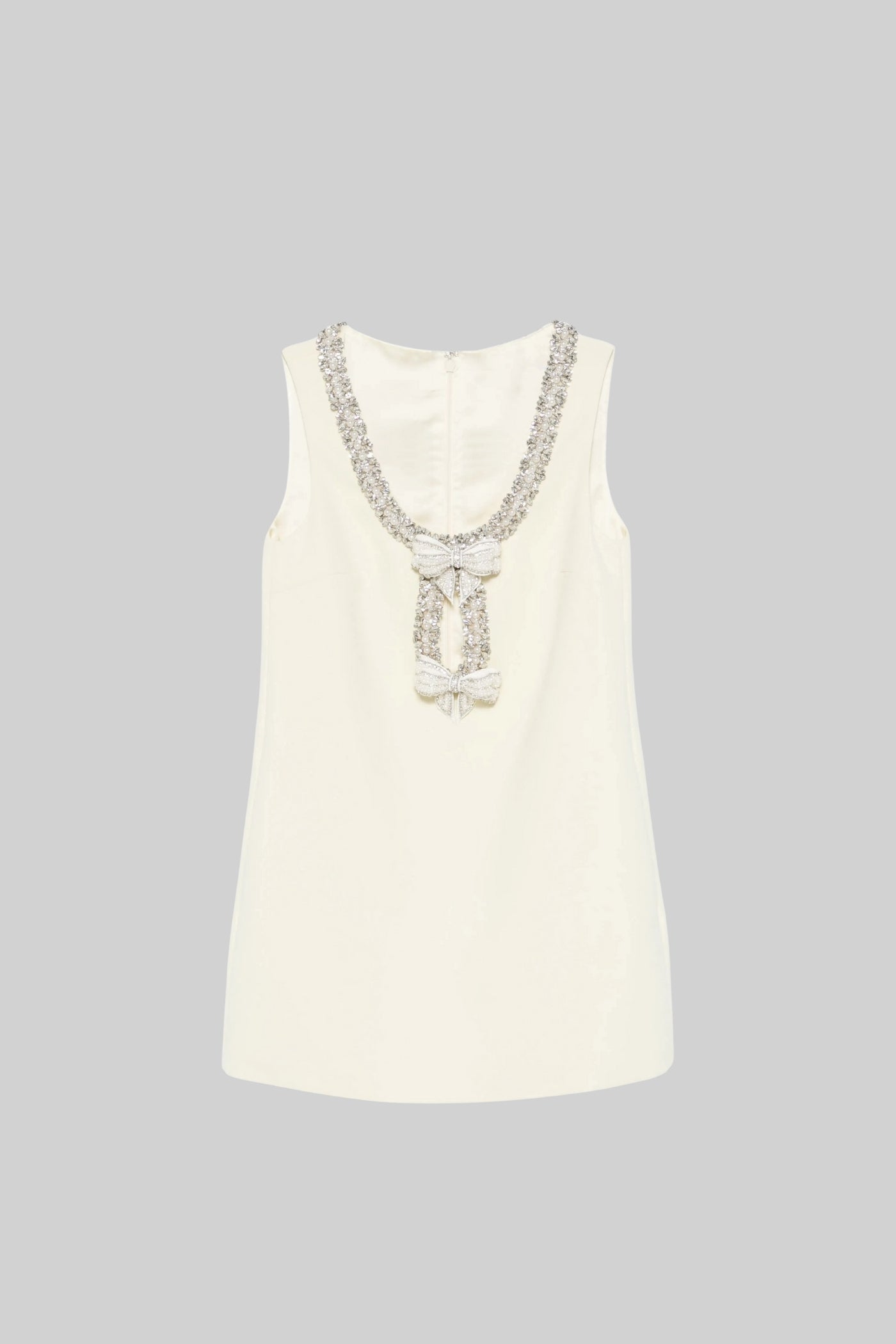 Sleeveless Mini Dress With Intricate Sparkling Neckline And Bow Embellishments - Ivoire