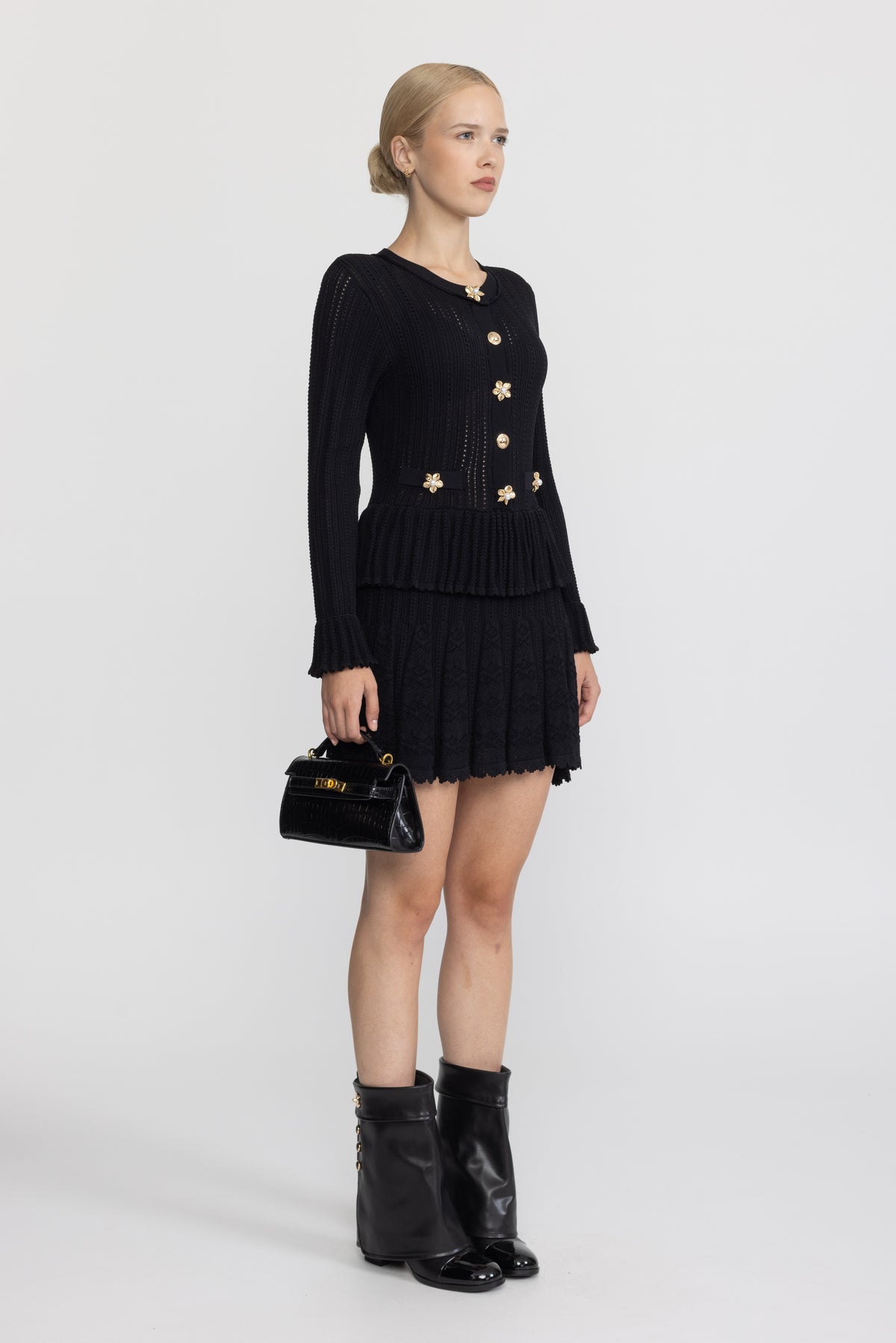 Rochie mini tricotată pointelle cu peplum și nasturi florali - negru 